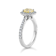 Charger l&#39;image dans la galerie, Luxurious ring in 18K white gold, featuring a 0.98ct fancy yellow diamond centerpiece surrounded by a halo and 34 diamonds totaling 0.48tcw, creating a dazzling display of brilliance and color.
