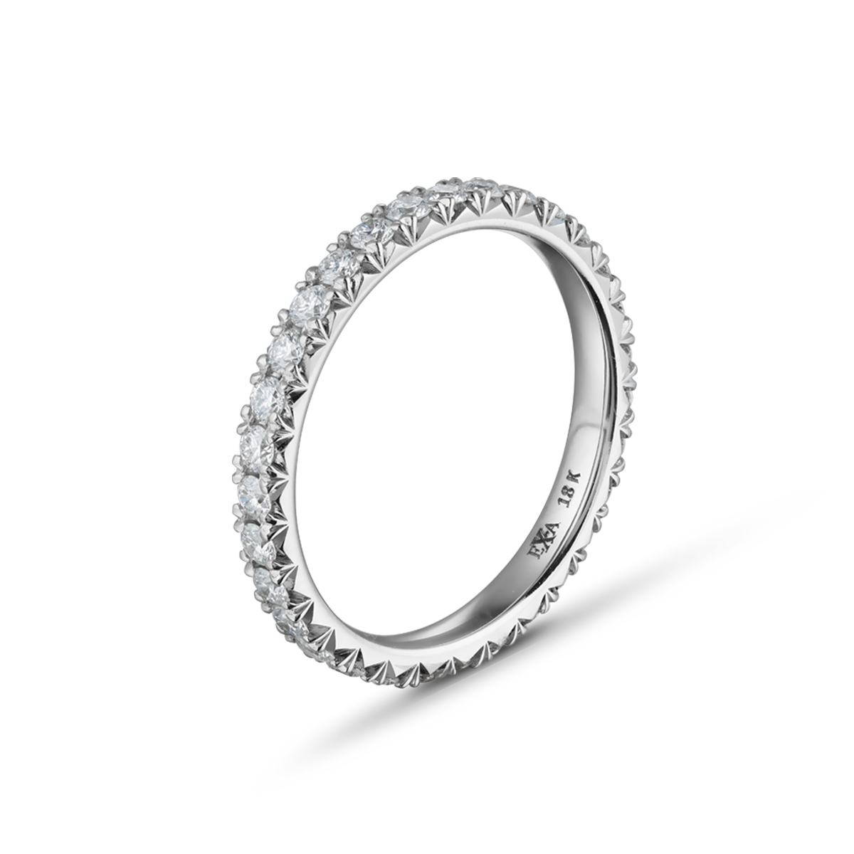 Exquisite ring in 18K white gold, weighing 1.90gr, featuring shimmering diamonds totaling approximately 0.62tcw set around the band with fancy nail set double beads and icicle cuts on the sides, offering a cool geometric flair and a polished interior.