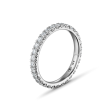 Load image into Gallery viewer, Exquisite ring in 18K white gold, weighing 1.90gr, featuring shimmering diamonds totaling approximately 0.62tcw set around the band with fancy nail set double beads and icicle cuts on the sides, offering a cool geometric flair and a polished interior.
