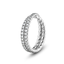 Load image into Gallery viewer, Unique band in platinum, weighing approximately 4.3gr, featuring an almost Mobius-twisting design with a crossover wrap adorned with 1.13tcw of round diamonds pavé set.
