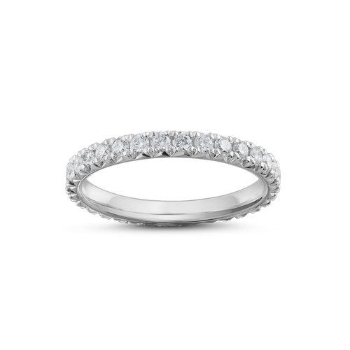 Exquisite ring in 18K white gold, weighing 1.90gr, featuring shimmering diamonds totaling approximately 0.62tcw set around the band with fancy nail set double beads and icicle cuts on the sides, offering a cool geometric flair and a polished interior.