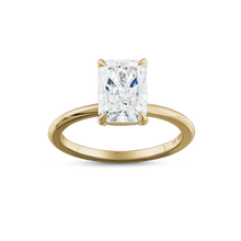 Charger l&#39;image dans la galerie, Solitaire in 18K white gold, featuring a 2.04ct radiant cut diamond in an eagle claw setting, embodying contemporary elegance with its simple yet striking design, handcrafted by Ex Aurum in Montreal.
