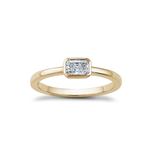 Elegant Radiant Sunbeam gold ring in 14K yellow gold, featuring a 0.31ct radiant cut diamond in a modern bezel setting, combining the rich warmth of the gold band with the dazzling sparkle of the diamond.