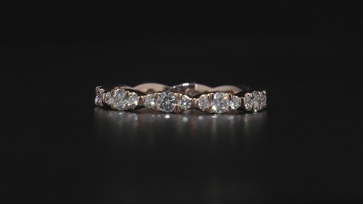 Video showing every angle of Golden Bloom. Dazzling full eternity ring in 18K yellow gold, featuring 1.05tcw of mixed-sized round brilliant diamonds pave set in leaflike sections, radiating life vitality and sparkling diamond fire.