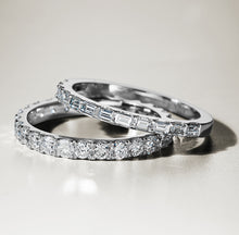 Load image into Gallery viewer, Elegant 18K white gold semi-eternity band, approximately 2.10gr, featuring 12 sleek baguette diamonds totaling an estimated 0.48tcw, designed for a sparkling and lean appearance.
