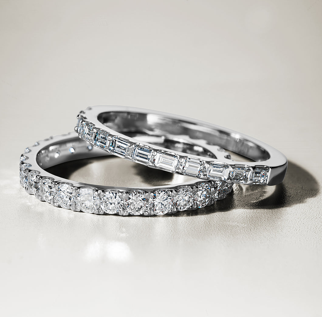 Elegant full eternity band in 18K white gold, featuring 1.35tcw of round brilliant diamonds evenly spaced around the band, symbolizing endless love and partnership.
