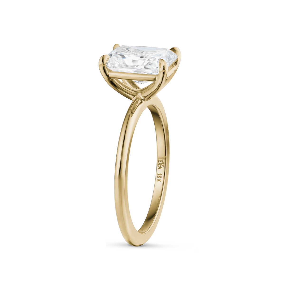 Solitaire in 18K white gold, featuring a 2.04ct radiant cut diamond in an eagle claw setting, embodying contemporary elegance with its simple yet striking design, handcrafted by Ex Aurum in Montreal.