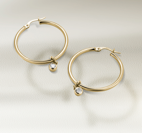 Versatile 14K yellow gold 19mm hoop earrings with detachable 0.10ct lab-diamond droplets, offering a transition from essential to elegant style, featuring bezel-set round brilliant lab diamonds totaling 0.20tcw.