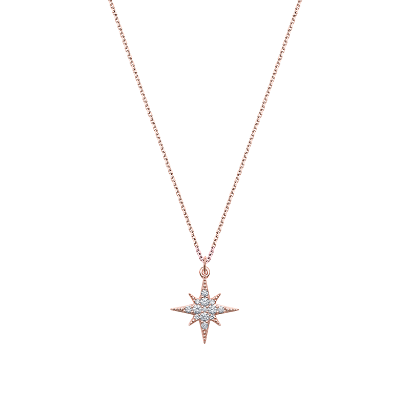 This 14K yellow gold pendant, handcrafted by Ex Aurum in Montreal, features a spiked shape adorned with 13 diamonds, totaling 0.18ct. It hangs on an 18" fine chain with a lobster clasp, measuring 14mm in length, and offers a choice between yellow or rose gold.