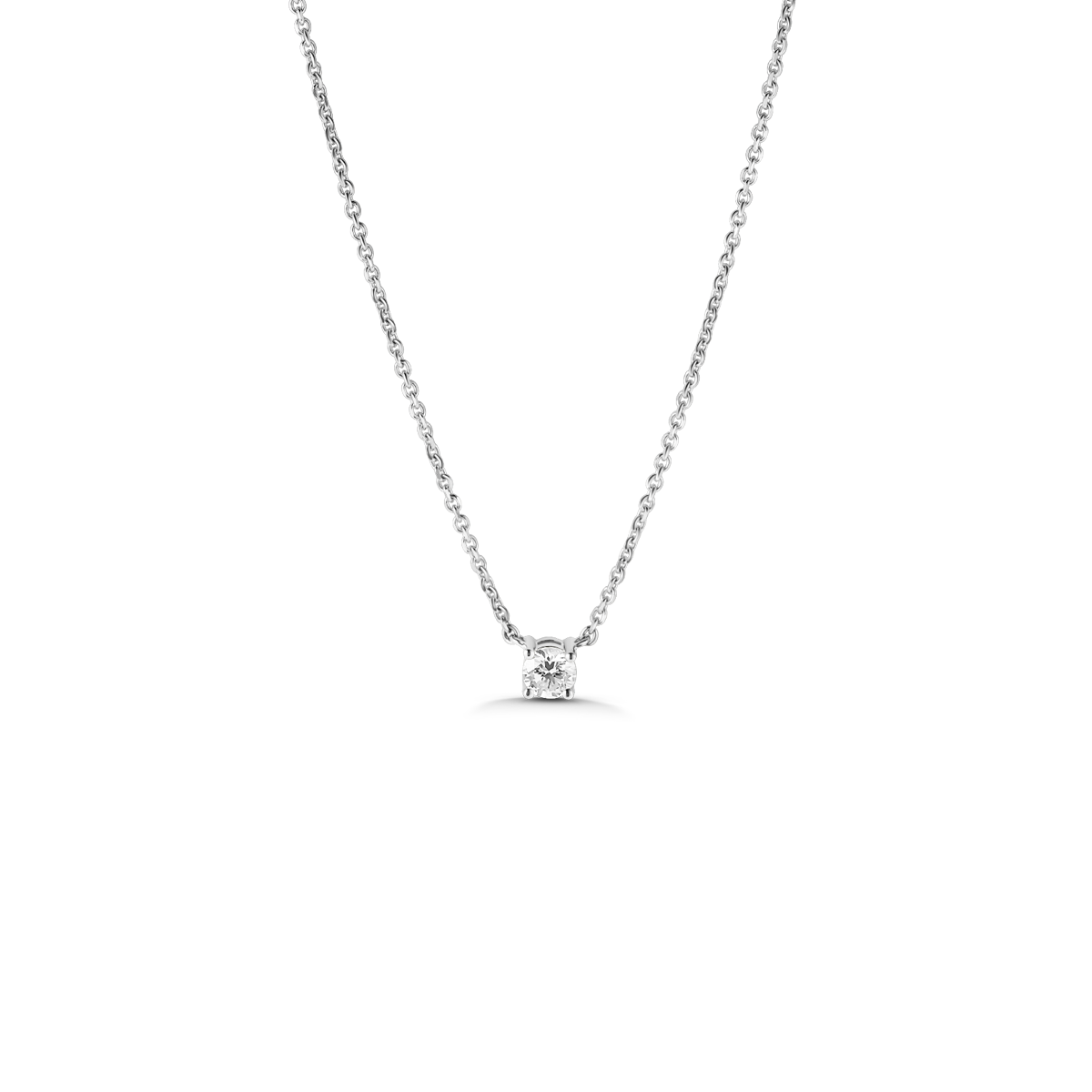 Elegant necklace featuring a 0.33ct round brilliant diamond set in 18K white gold, suspended between two delicate chains, offering a classic look with a touch of brilliance, handcrafted by Ex Aurum in Montreal.