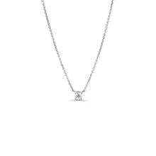 Charger l&#39;image dans la galerie, Elegant necklace featuring a 0.33ct round brilliant diamond set in 18K white gold, suspended between two delicate chains, offering a classic look with a touch of brilliance, handcrafted by Ex Aurum in Montreal.
