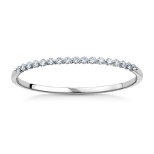 Charger l&#39;image dans la galerie, Elegant 18K white gold bangle featuring 17 round brilliant diamonds totaling approximately 1.19ctw, set in a shared prong technique for a contemporary and airy design, creating a dazzling effect.
