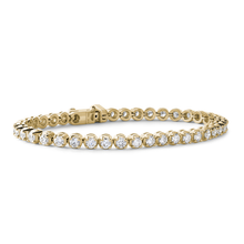 Charger l&#39;image dans la galerie, Stunning 18K yellow gold bracelet shimmering with 4.40tcw diamonds in a four-prong setting, featuring geometric patterns for brilliance and comfort, secured with a box clasp and slip-lever lock.
