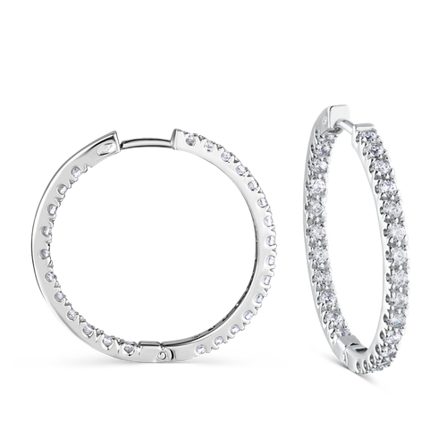 Hoops in 18K white gold, handcrafted by Ex Aurum in Montreal, featuring 52 round brilliant diamonds totaling approximately 1.82tcw, set both inside and out on 25mm hinged hoops for a captivating visual impact.