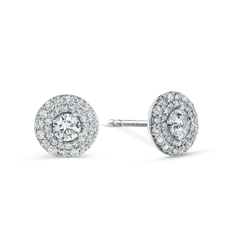 Stylish stud earrings in 18K white gold, each with a 9mm disc featuring a double row of pavé diamonds totaling approximately 0.76ctw, centered with claw-set diamonds for a dimensional and voluminous look.