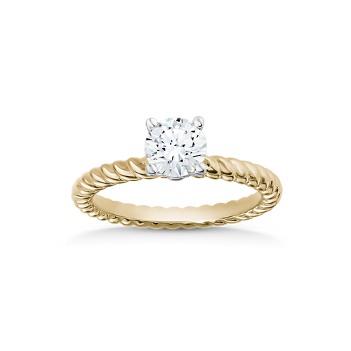 Exquisite ring in 18K yellow and white gold, featuring a 0.62ct round brilliant diamond in a four-prong white gold setting, with a uniquely twisted yellow gold band.