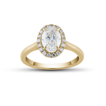 Charger l&#39;image dans la galerie, Elegant 18K yellow gold ring featuring a 1.02ct round brilliant diamond with a pavé halo and a cathedral shoulder design, offering a glowing and dimensional appearance, complemented by 0.18tcw of smaller pavé set diamonds.
