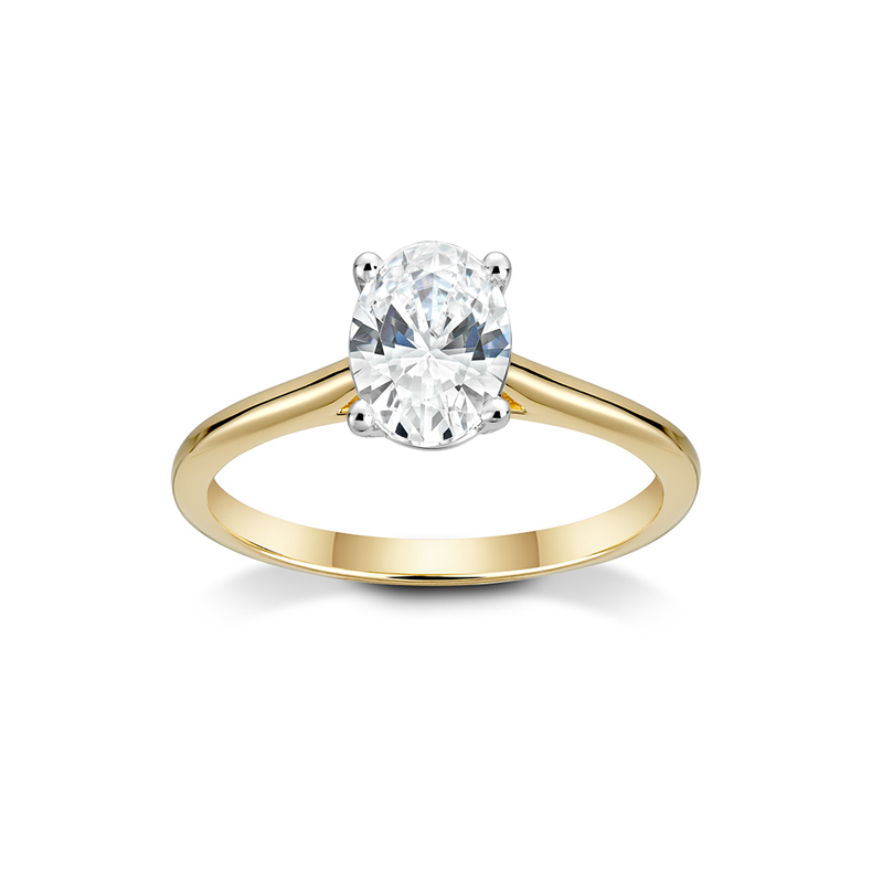 Elegant engagement ring in 18K yellow gold with a white gold setting, featuring a 1ct oval diamond in a four claw setting, designed to elongate the hand.