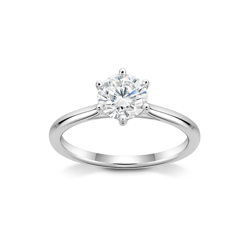 Elegant 18K white gold solitaire engagement ring featuring a 1ct round brilliant diamond in a six-claw setting, symbolizing harmony and stability, handcrafted by Ex Aurum in Montreal.