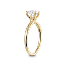 Load image into Gallery viewer, Elegant 14K yellow gold engagement ring, featuring a 1ct round brilliant diamond in a four-claw setting, with a gracefully tapering band, evoking the image of a delicately clasped bouquet, handcrafted in Montreal.
