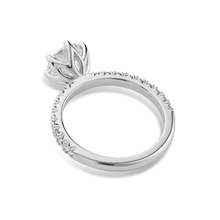 Load image into Gallery viewer, Stunning 18K white gold solitaire ring, featuring a 1.20ct round brilliant VS1 D diamond in a six-claw setting, with a flame-shaped design and 0.36tcw pavé set diamonds along three-quarters of the slim band.
