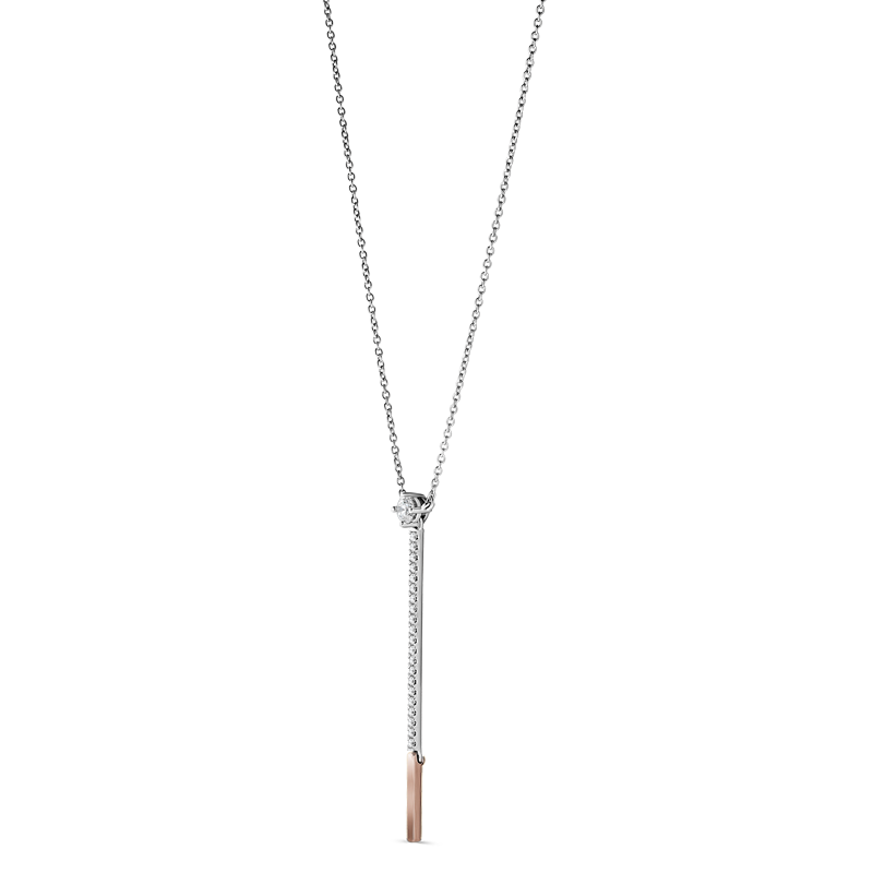 Elegant necklace in 18K yellow and white gold, symbolizing inspiration and hope, featuring a diamond with a pavé tail on a 16" chain with a 1.75" drop and moving yellow gold tip.