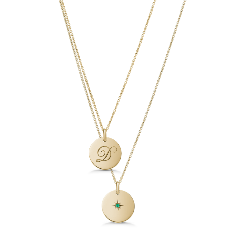 Unique double-sided 14K yellow gold pendant, featuring a script-styled initial on one side and a gemstone set in a diamond-cut star pattern on the reverse, measuring 15mm in diameter, accompanied by an 18" adjustable chain.