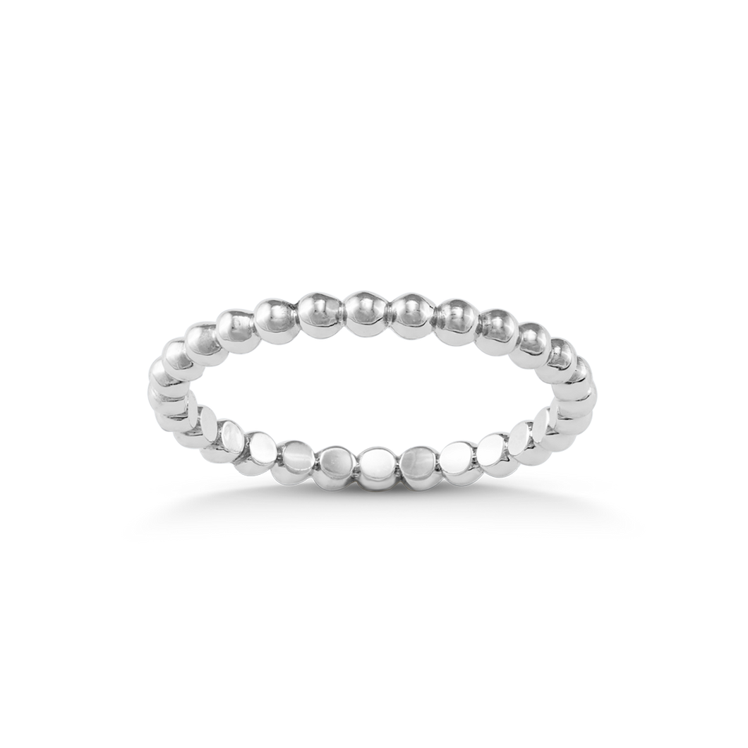Elegant beaded band of 18K high polished white gold balls. Add a notch of patterned contrast when mixing with other styles.
