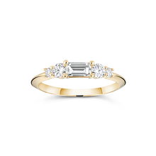Charger l&#39;image dans la galerie, 18K yellow gold engagement ring with a distinctive low knife-edged band, featuring a 0.31ct baguette cut diamond center, flanked by four round brilliant diamonds totaling 0.58tcw in prong settings, creating a scaffold-like structure.
